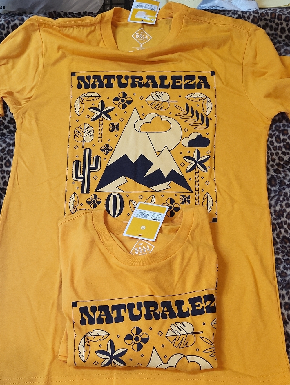 Yellow w/ black letters "Naturaleza" new w/ tags t-shirt short sleeved small